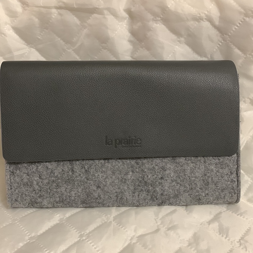 La prairie faux leather wool felt makeup clutch